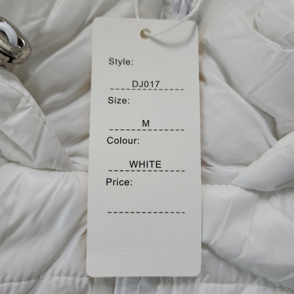 Daisy Crop Zip Up Puffer Vest. Size Medium. New. Open sides that tie. - Picture 7 of 7